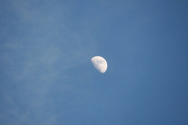 In a clear sky, the outgoing moon