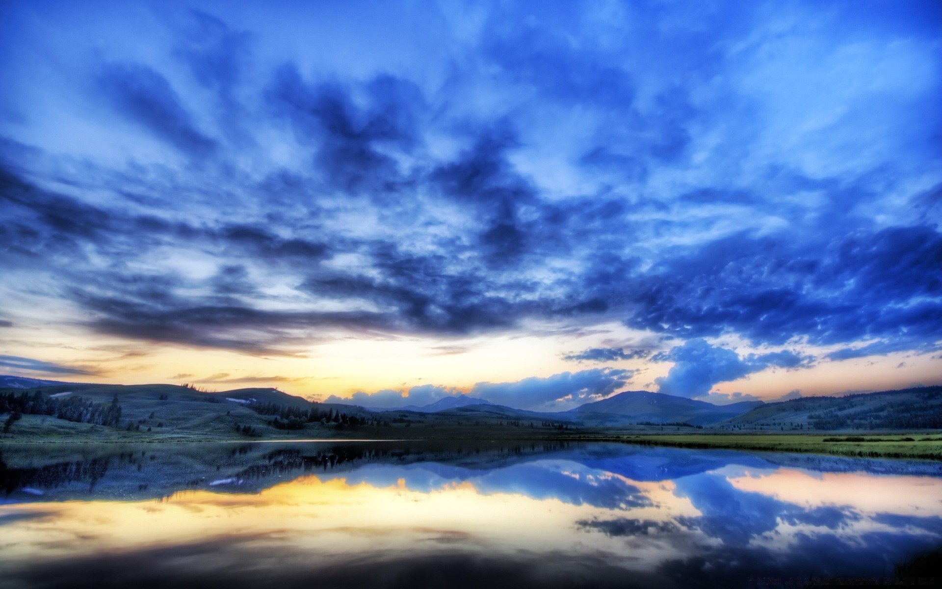 the sky sunset water sky dawn nature outdoors dusk evening landscape summer sun travel fair weather sea ocean beach