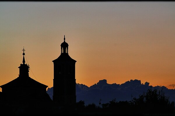 Orthodox church as a silhouette at evening sunset