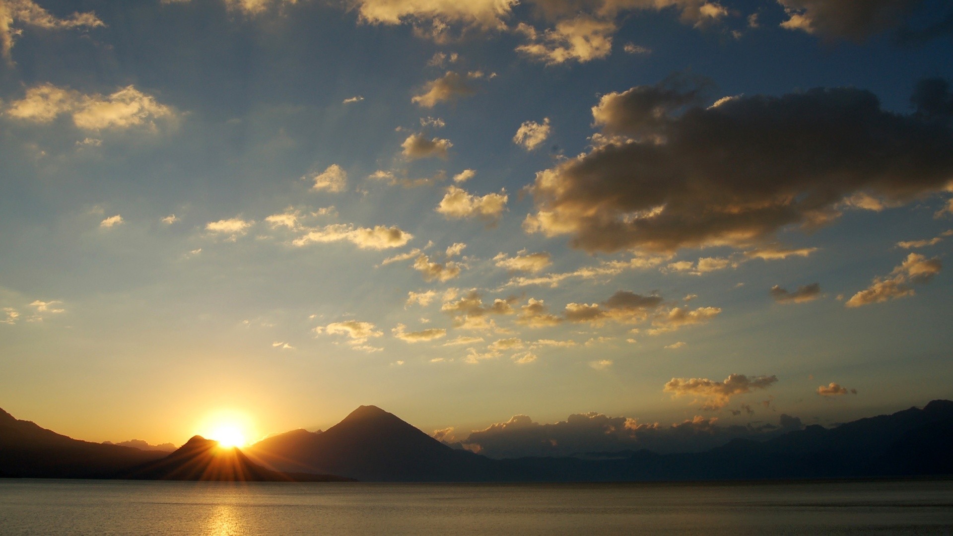 the sky sunset water dawn sun evening dusk landscape beach sea sky backlit lake ocean seascape travel