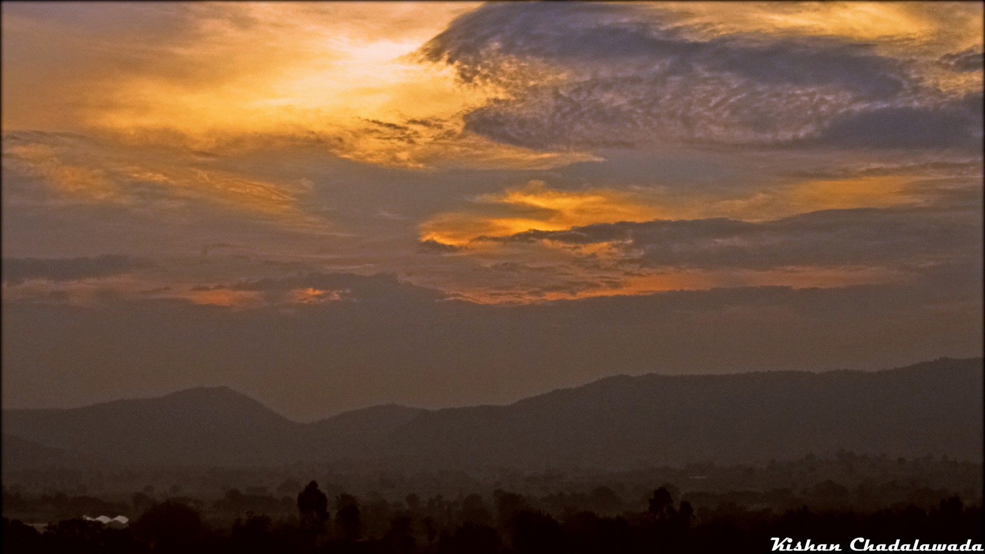 the sky sunset dawn sky landscape dusk outdoors evening nature sun fog mountain travel fair weather light