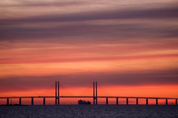 Landscape of a sea sunset. Bridge