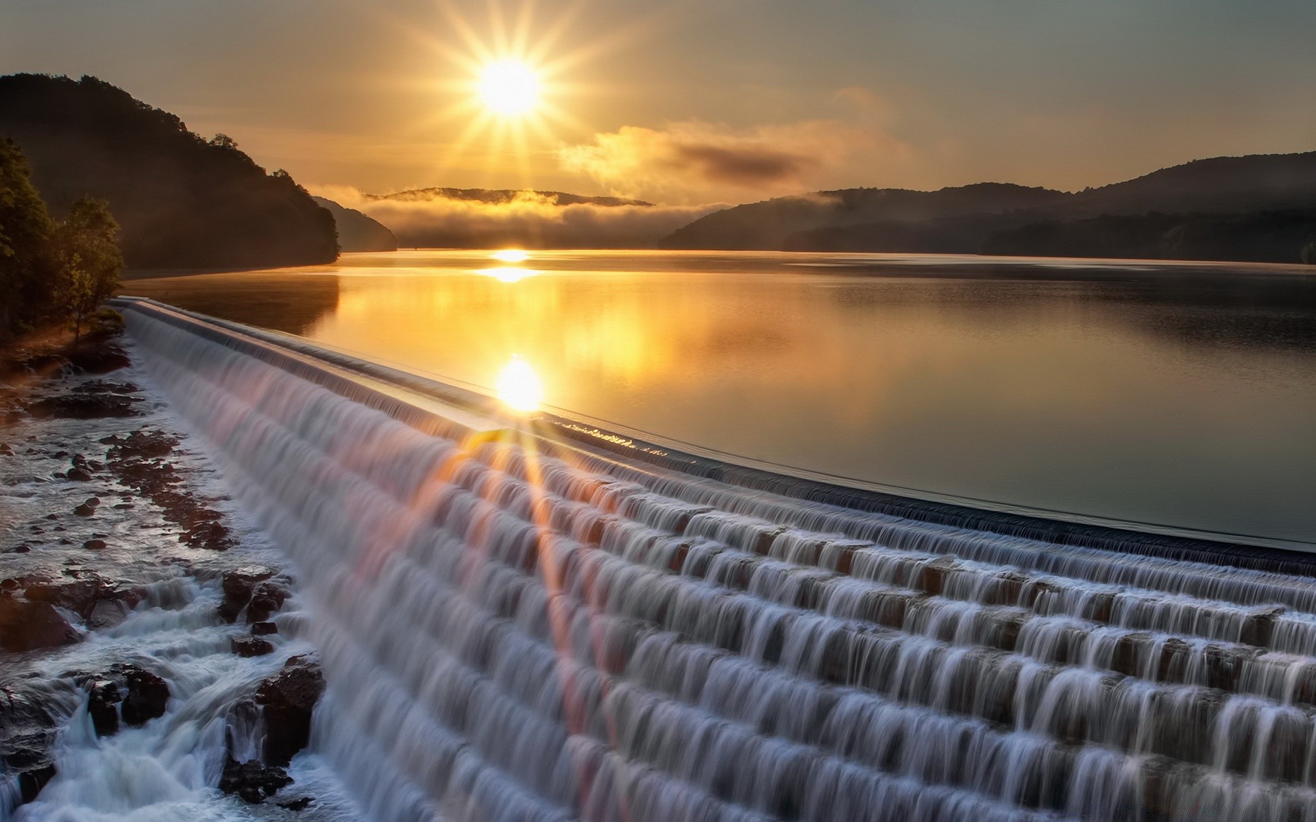 waterfalls sunset water dawn dusk evening nature reflection sky sun landscape travel river lake light beach sea