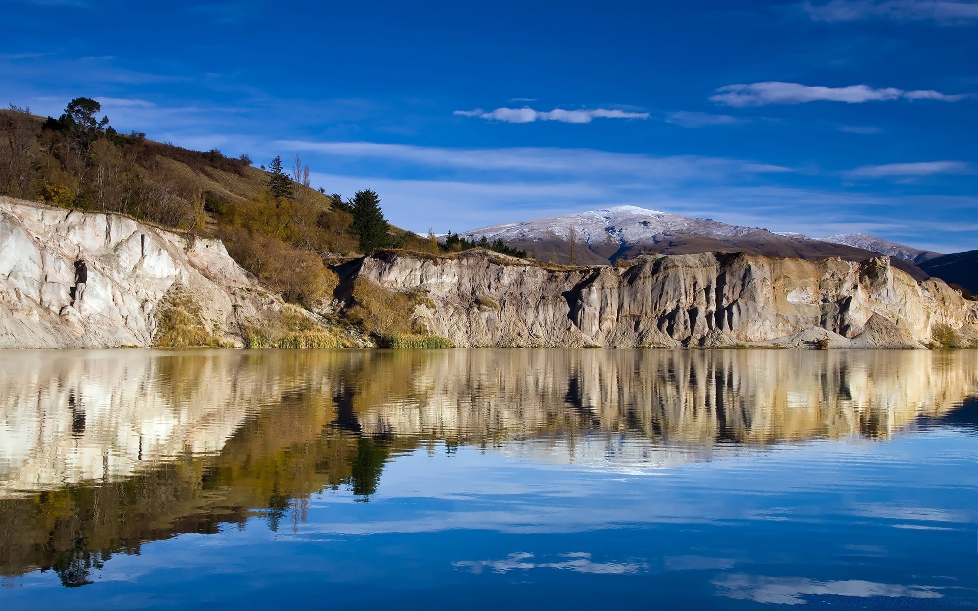 lake water landscape nature travel sky outdoors scenic seashore sea rock reflection mountain ocean daylight tourism