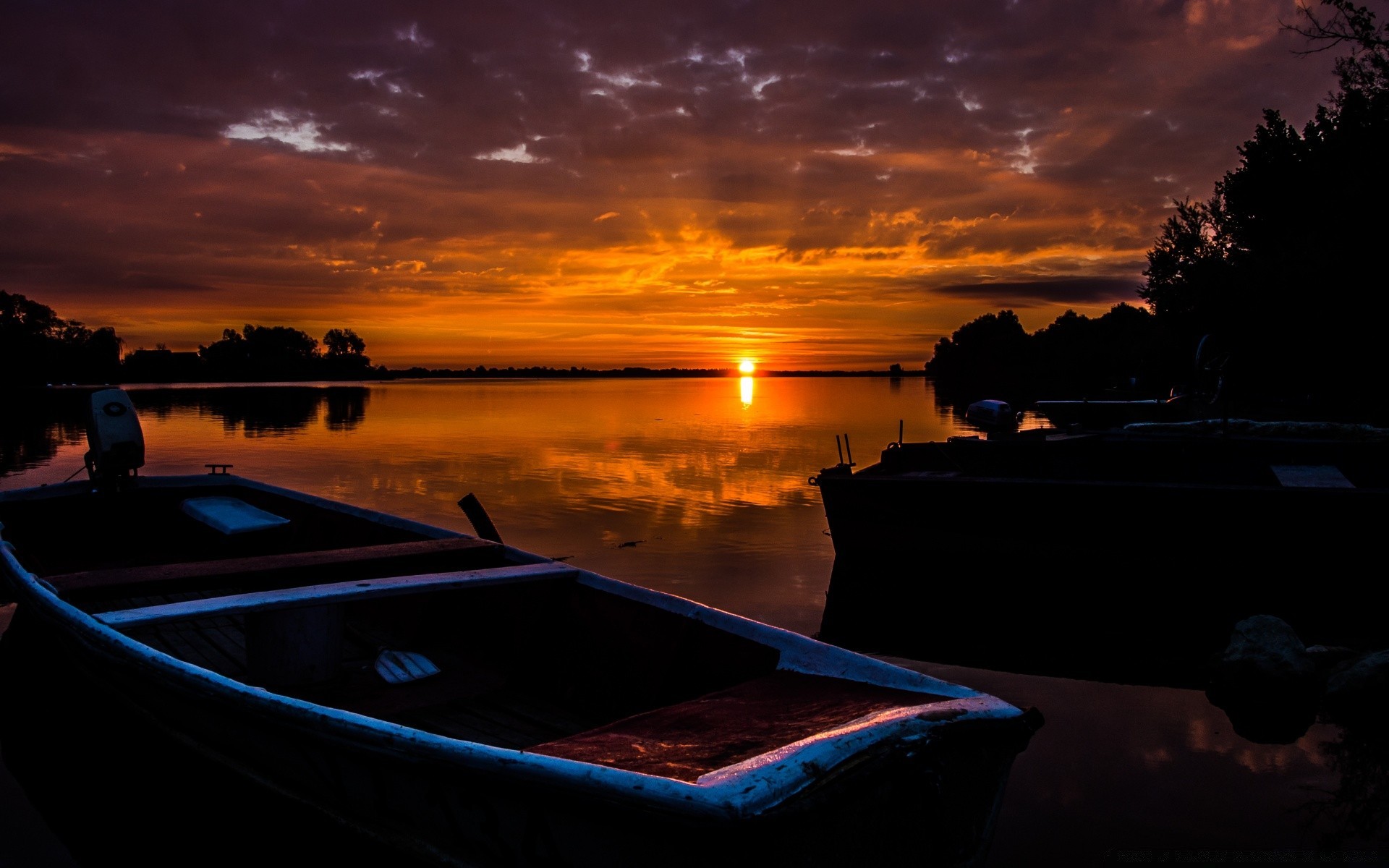 lake sunset water dusk travel dawn evening sun vehicle beach sky transportation system outdoors light landscape sea boat