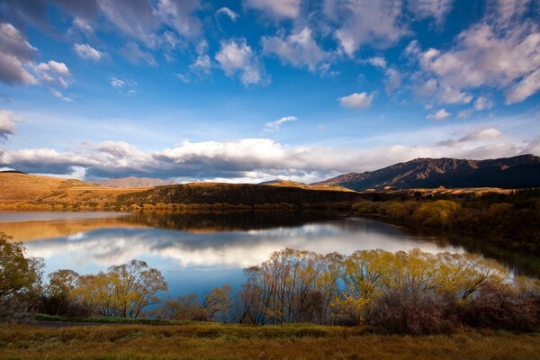 In autumn there is a beautiful sunset on the lake