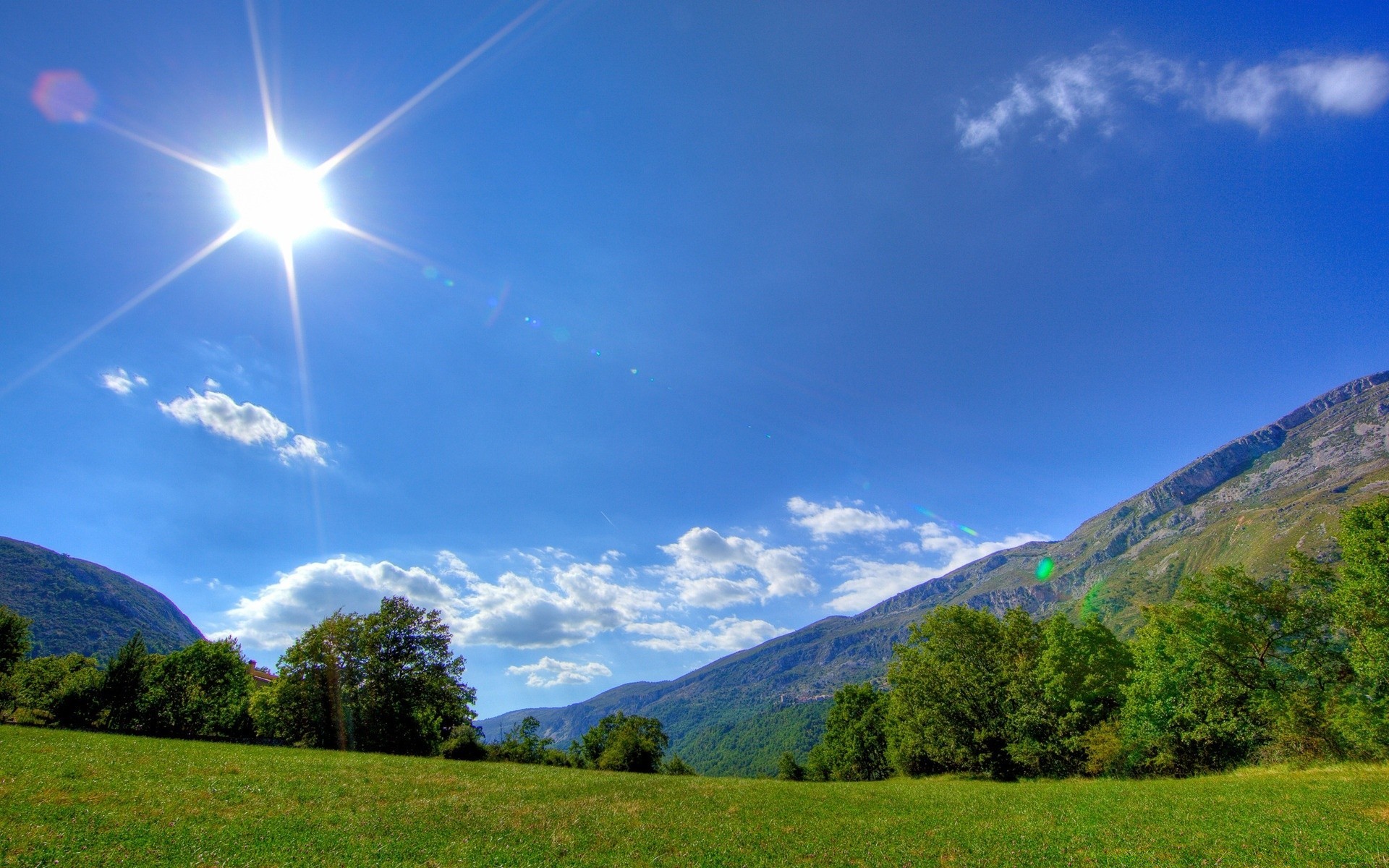 spring nature landscape sky mountain grass travel tree outdoors fair weather sun summer wood rural hill countryside