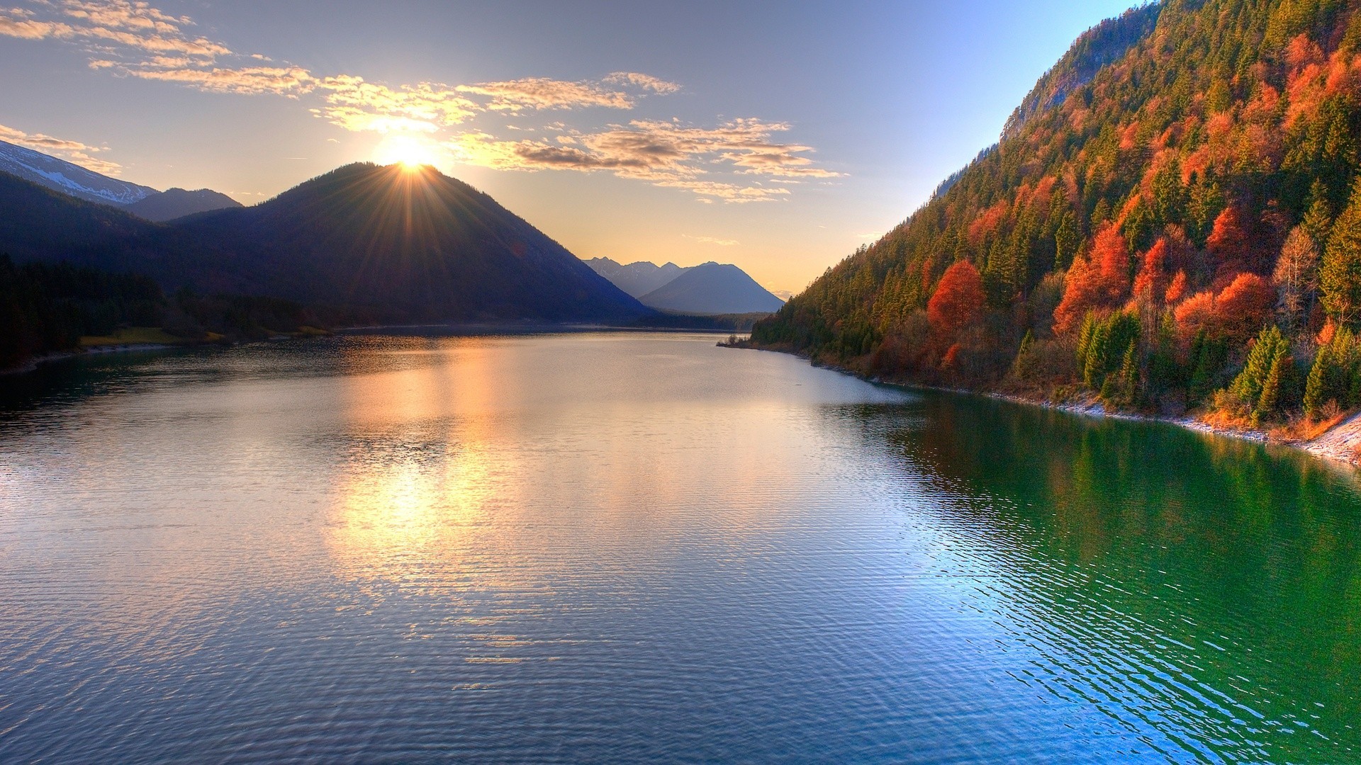 lake water sunset dawn mountain nature reflection landscape travel evening outdoors sky dusk sun