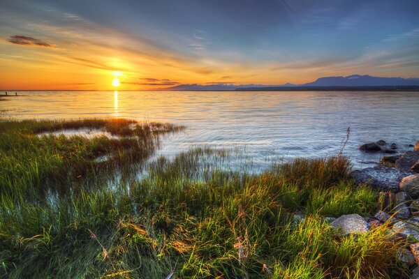 Incredible sunset in the waters of the lake