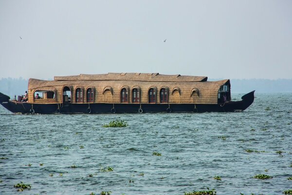 An unusual barge floats on the lake