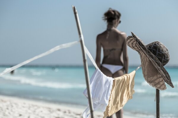 Girl on the beach by the sea