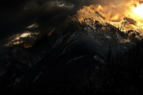 Landscape winter sunset in the mountains