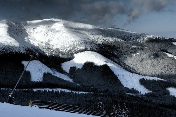 Bare hills of mountains in the snow