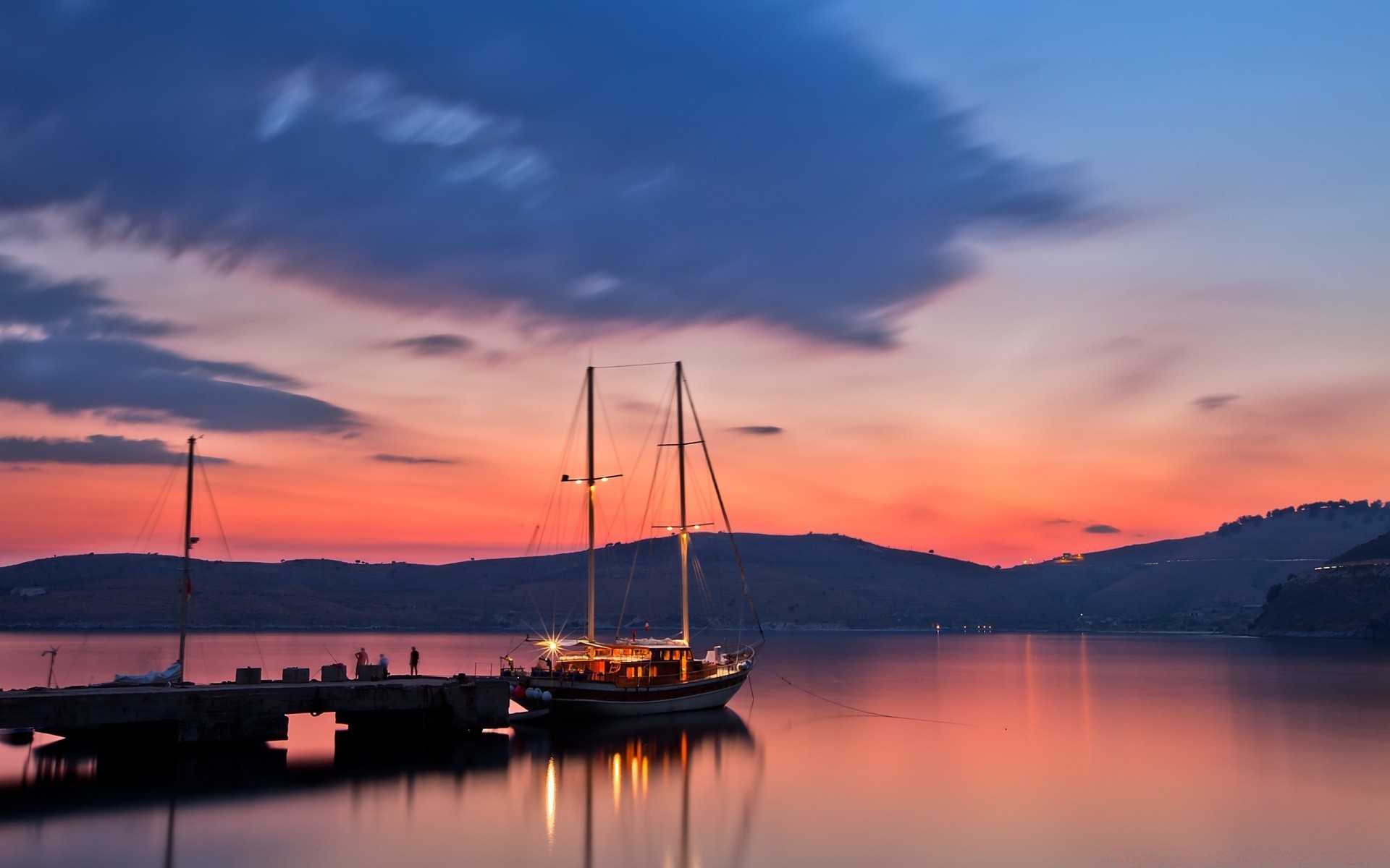 lake water sunset sky travel dawn evening sea reflection dusk watercraft sailboat transportation system harbor