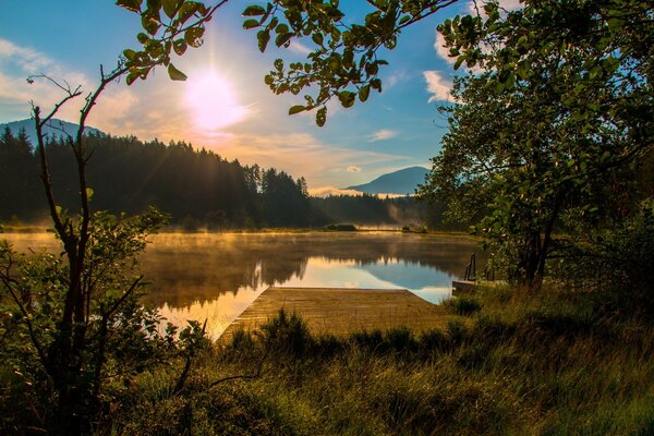 The bridge by the lake in the morning sun