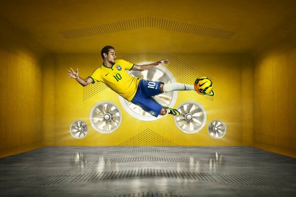 A football player with a ball in a jump. Car rims