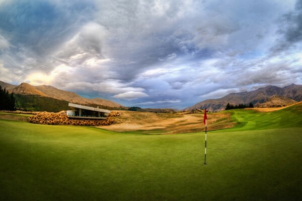 Golf course with green grass