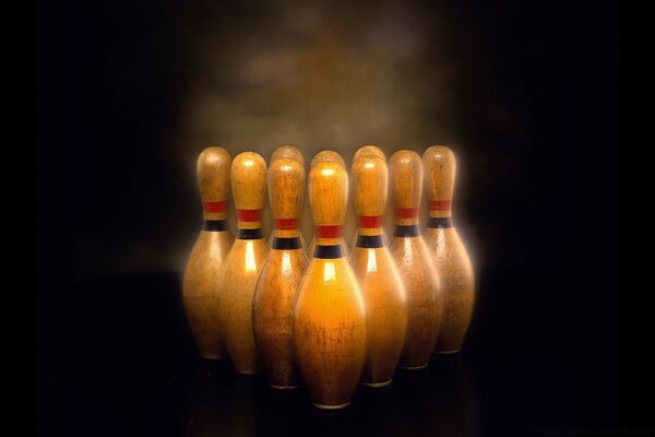 Bowling pins are lined up in the fog