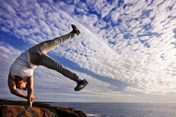 A sporty man among the snow-white sky