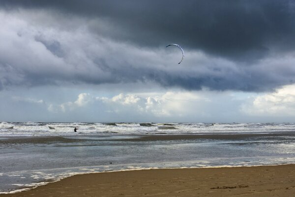 The cold sea. Sandy beach