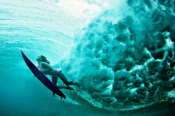 Surfing photo of an underwater girl