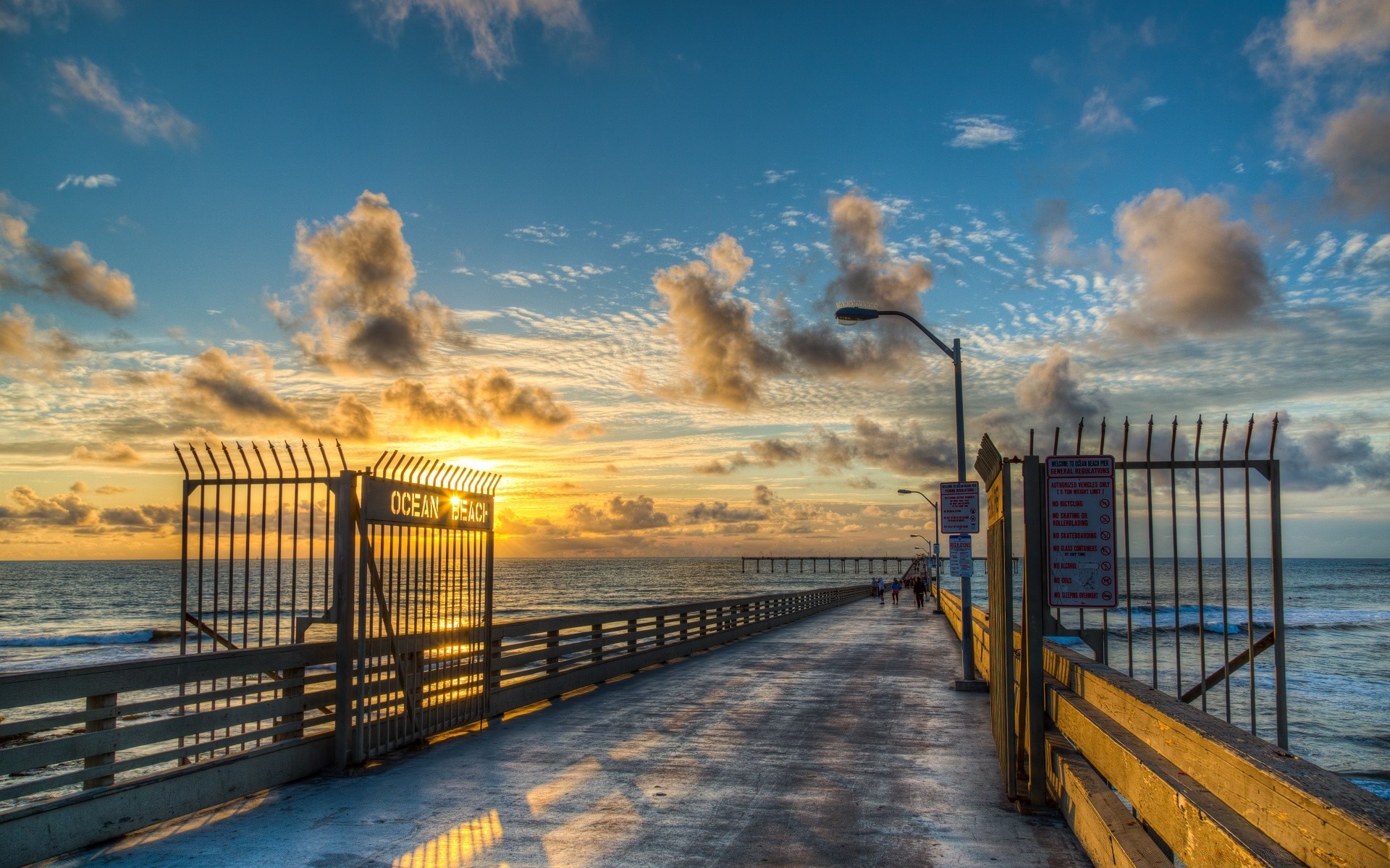 america spiaggia tramonto acqua mare alba molo viaggi oceano mare cielo recinzione ponte sole paesaggio passerella all aperto crepuscolo sera luce