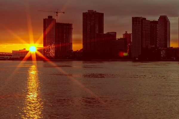 Evening city in the twilight of sunset