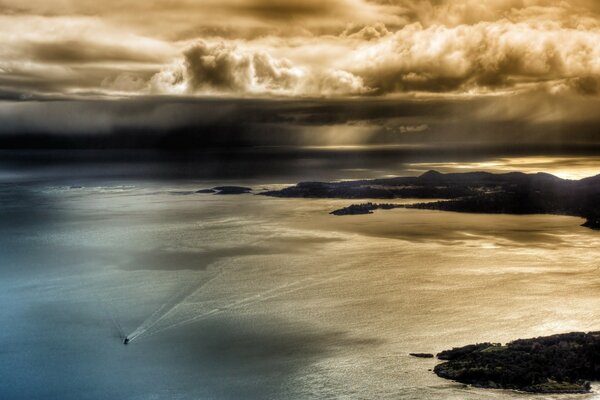 A lonely boat on the background of the coming storm