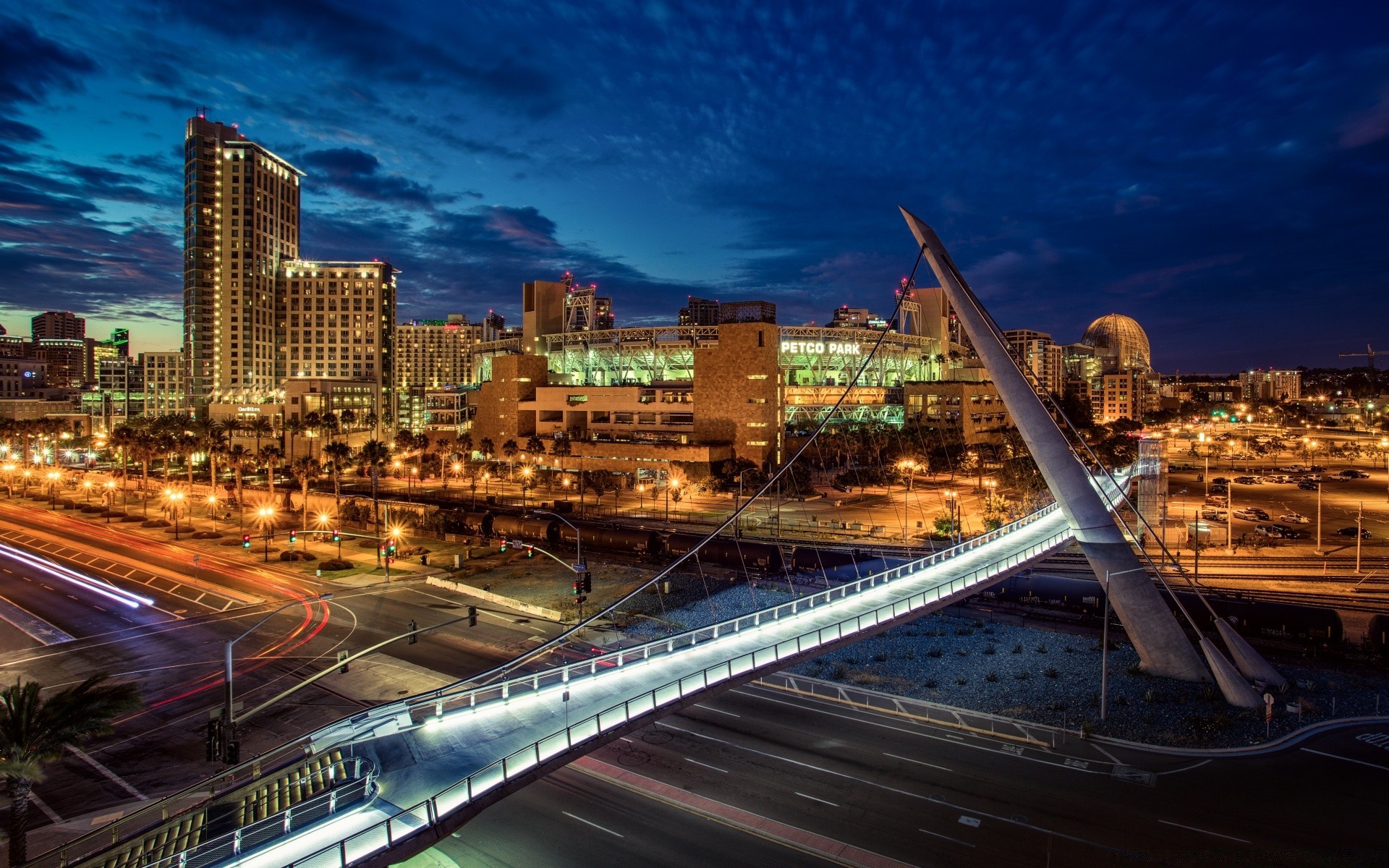 america city highway traffic dusk transportation system road travel skyscraper evening expressway cityscape building bridge downtown architecture urban modern car blur skyline