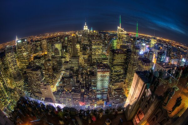 Wide angle photo of skyscrapers at night