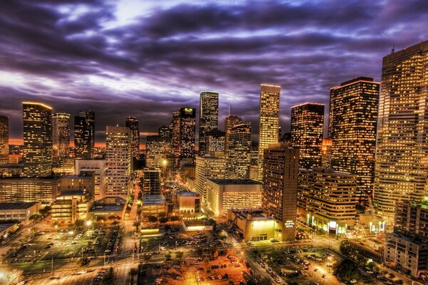 Illuminated city and night sky