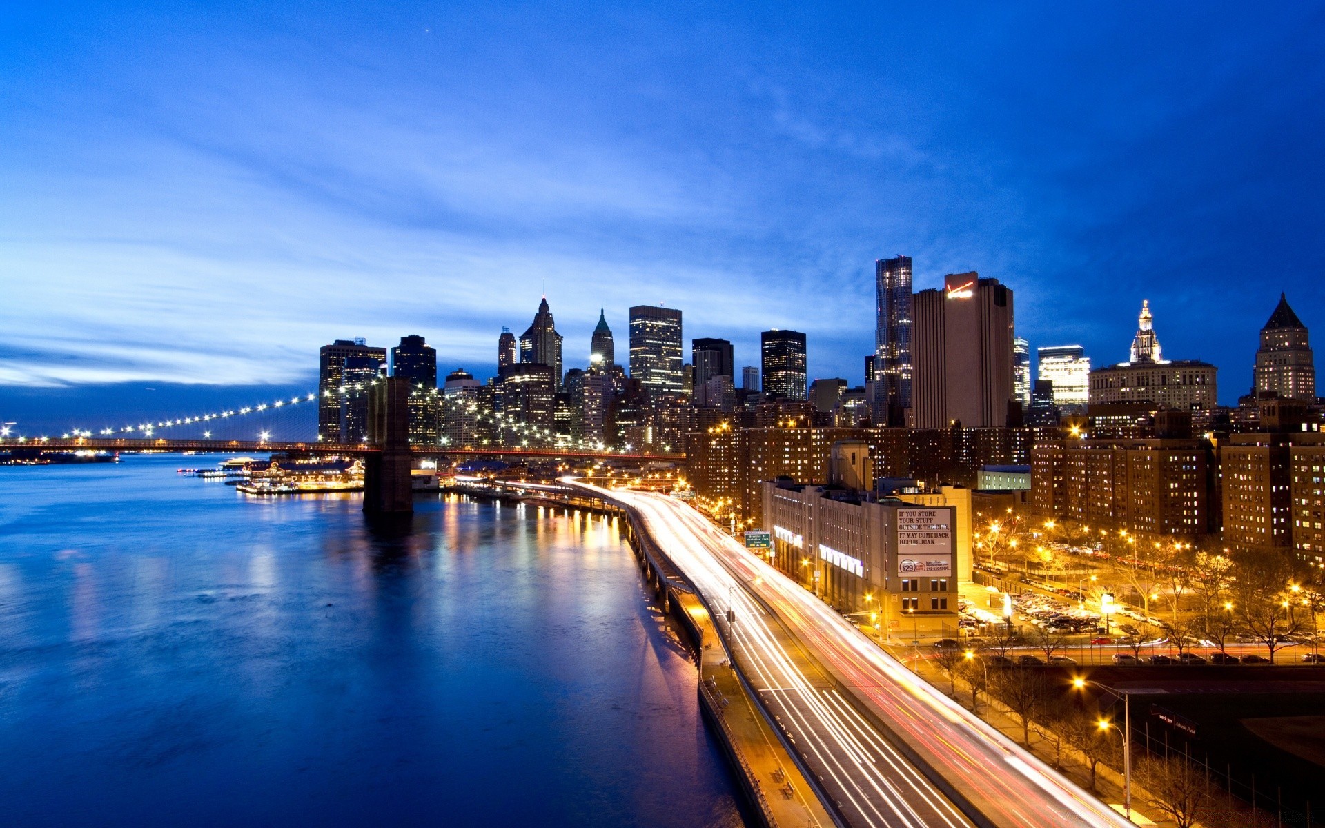 america city downtown dusk skyscraper cityscape skyline travel architecture evening traffic building bridge water urban sunset sky river transportation system office waterfront