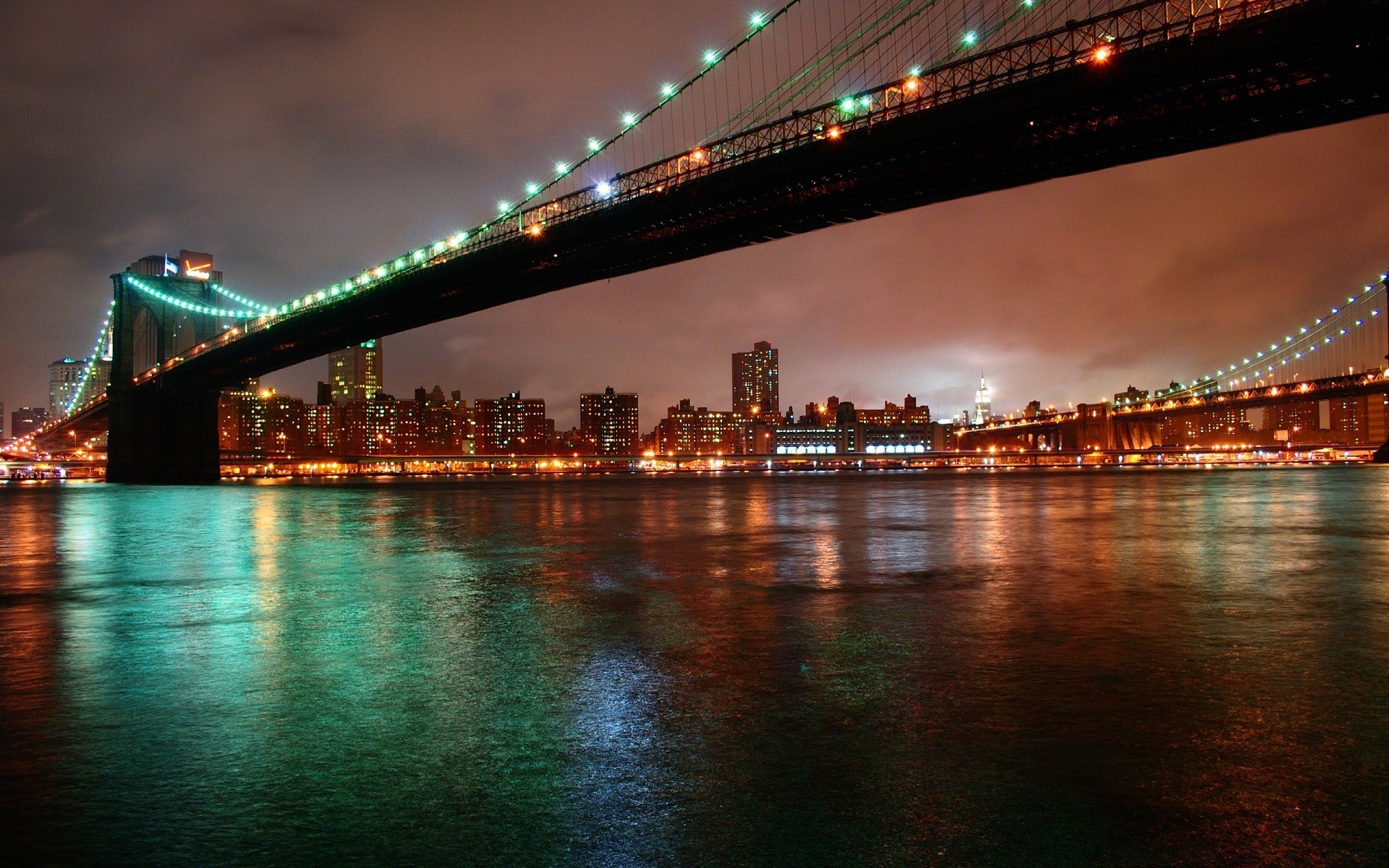 america bridge water city architecture travel river evening sunset dusk suspension bridge connection transportation system sky urban light cityscape reflection building downtown