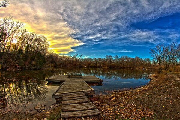 A beautiful sky that is reflected in the water