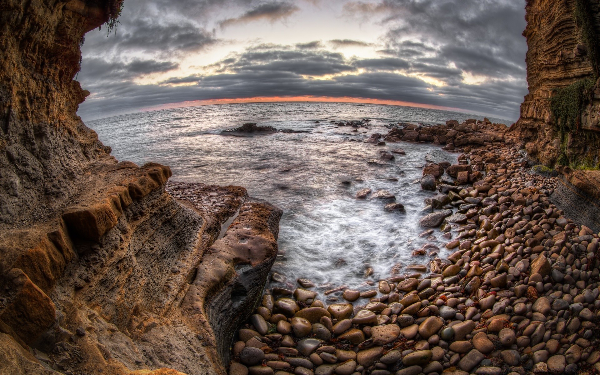 america water dawn seashore travel nature sunset beach rock sea sky outdoors landscape ocean