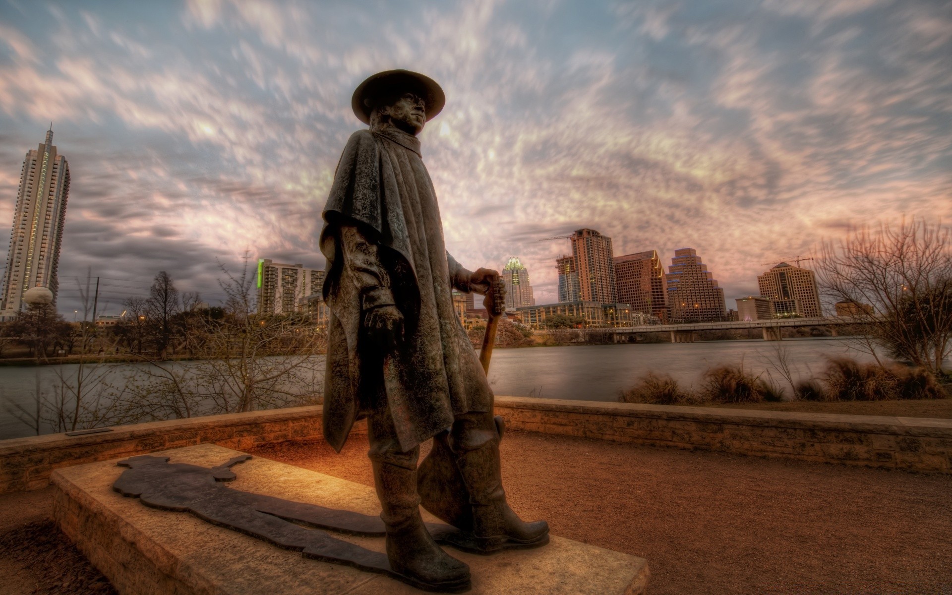 america adulto una persona viaggi religione scultura statua città all aperto albero tramonto