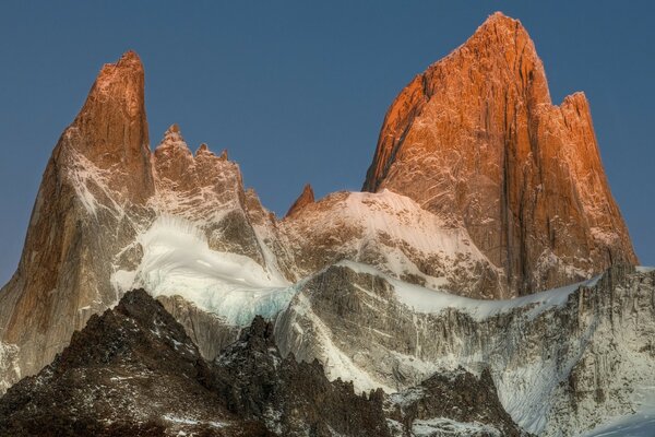 Mountains in the snow at the edge of the Earth