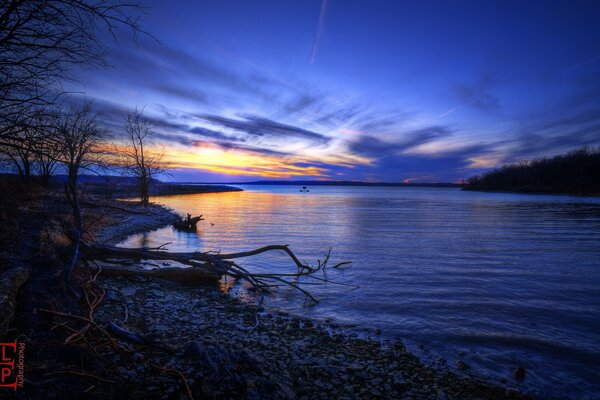 The confluence of water and sky on the horizon