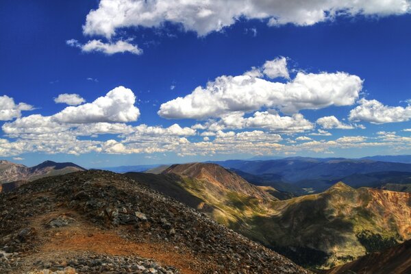 Mountains, with clouds hovering above them