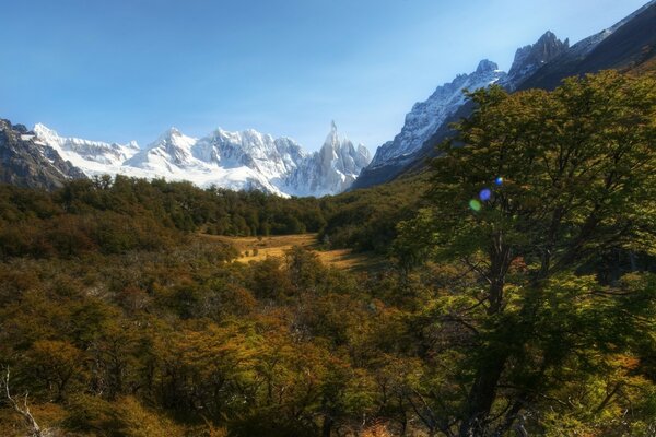 The clash of warm earth and cold mountains