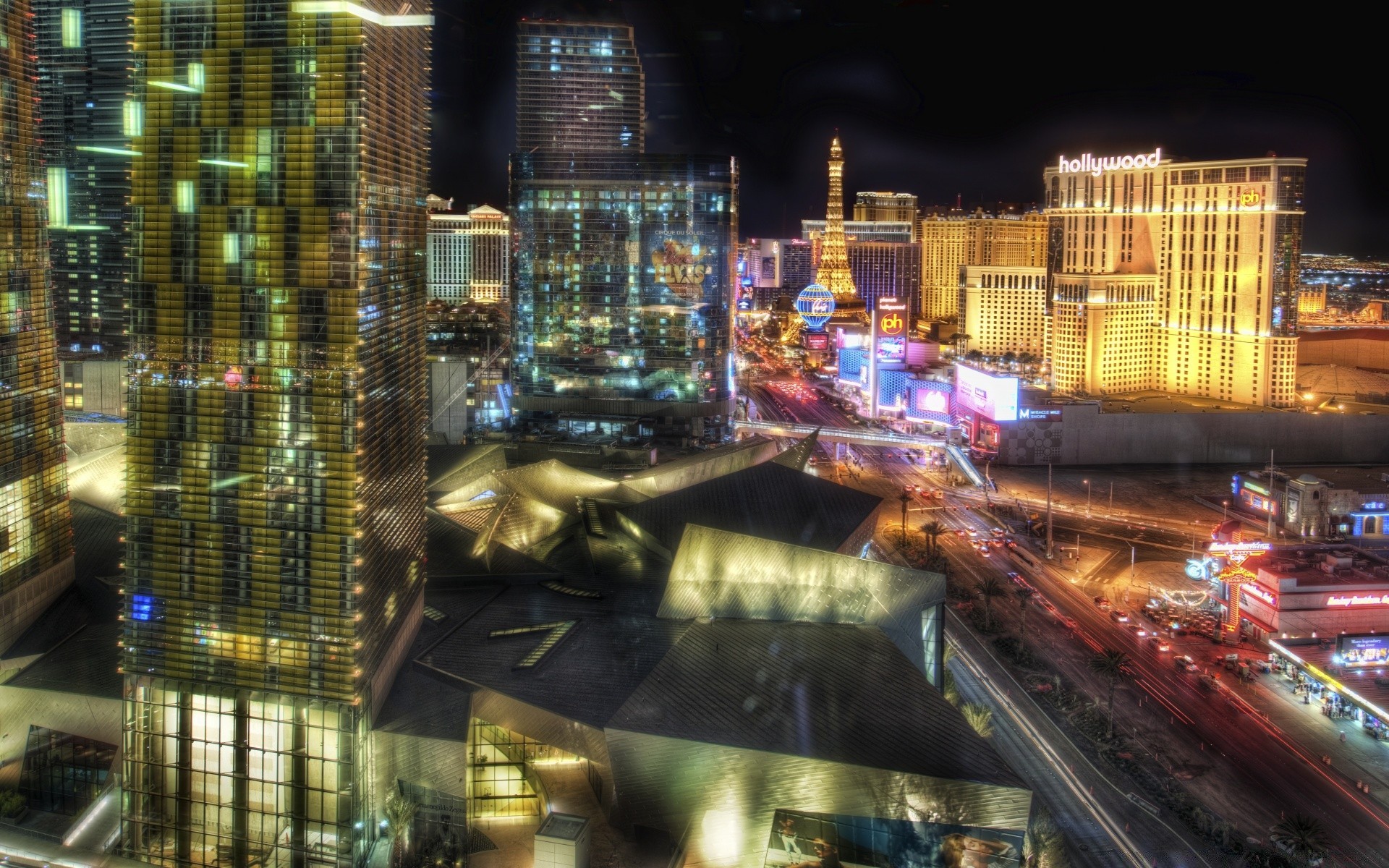 america city evening downtown dusk travel business urban road traffic building architecture skyscraper illuminated light cityscape street modern blur scene neon