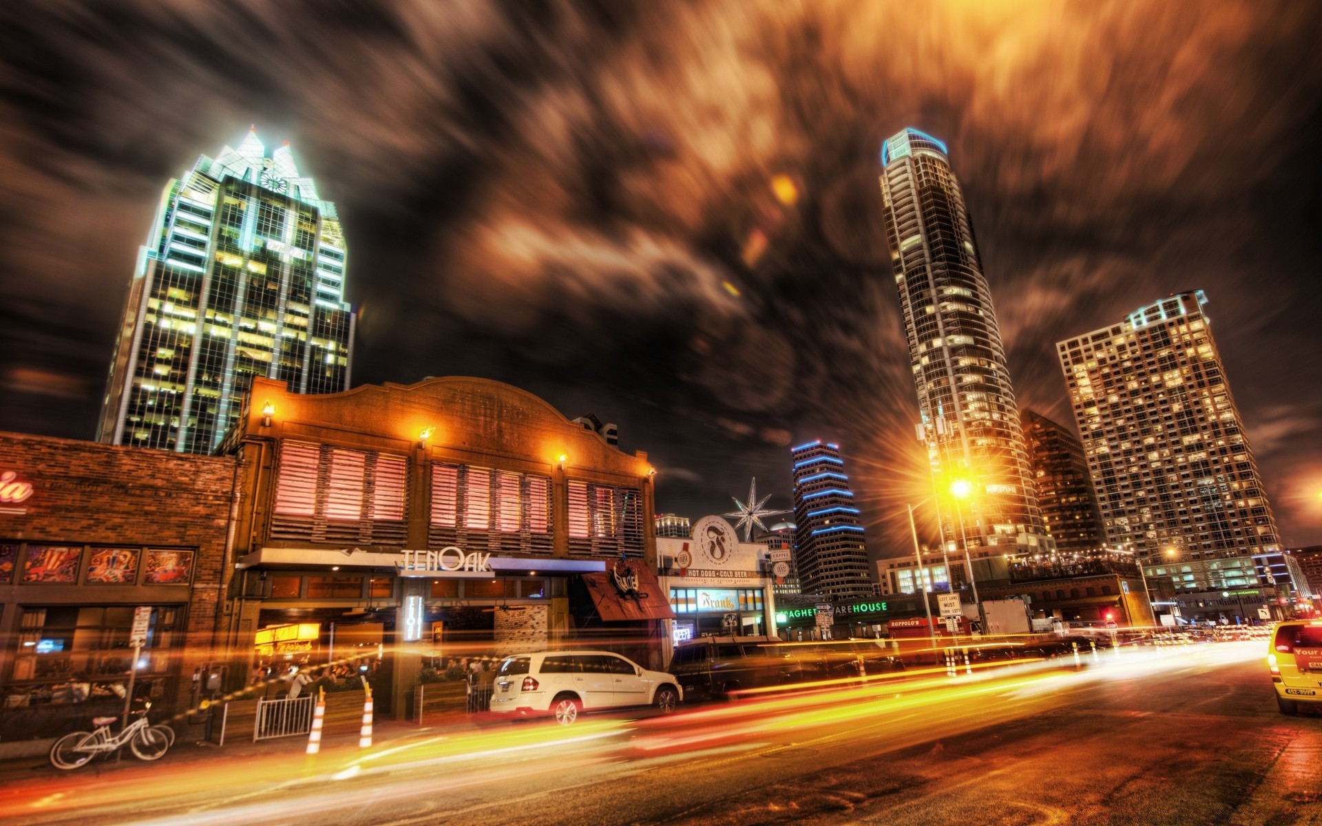 américa ciudad crepúsculo rascacielos centro de la ciudad noche viajes hogar arquitectura urbano tráfico carretera calle iluminación sistema de transporte ciudad autobús luz coche desenfoque puente