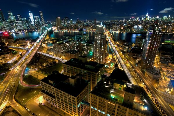 A bright densely populated metropolis at night