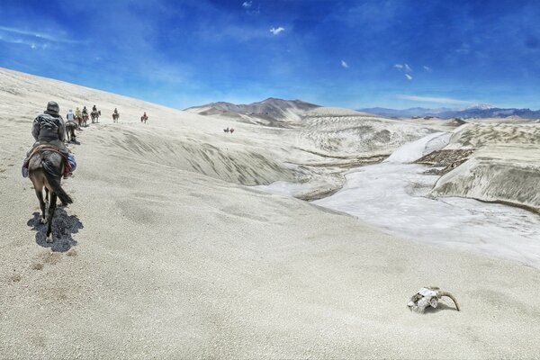 Caravan journey in the sandy desert