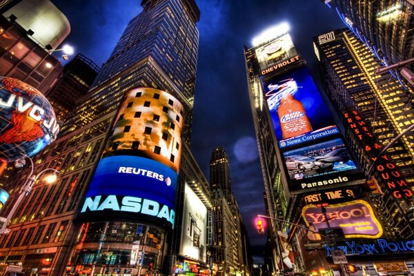 Night high-rises of houses with neon advertisements