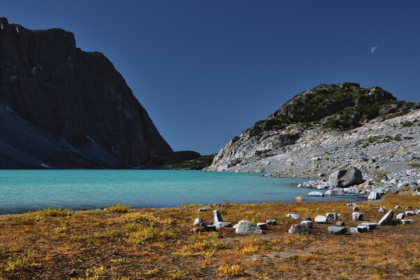 Rocky shore and azure lake