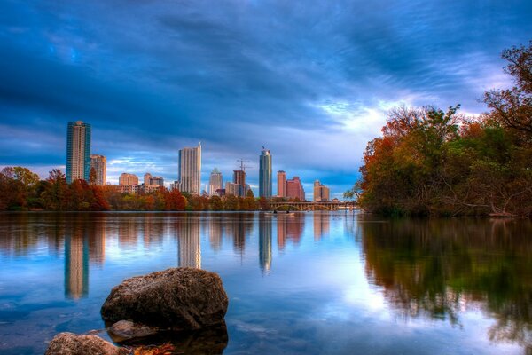 The sky and the city in the reflection of water