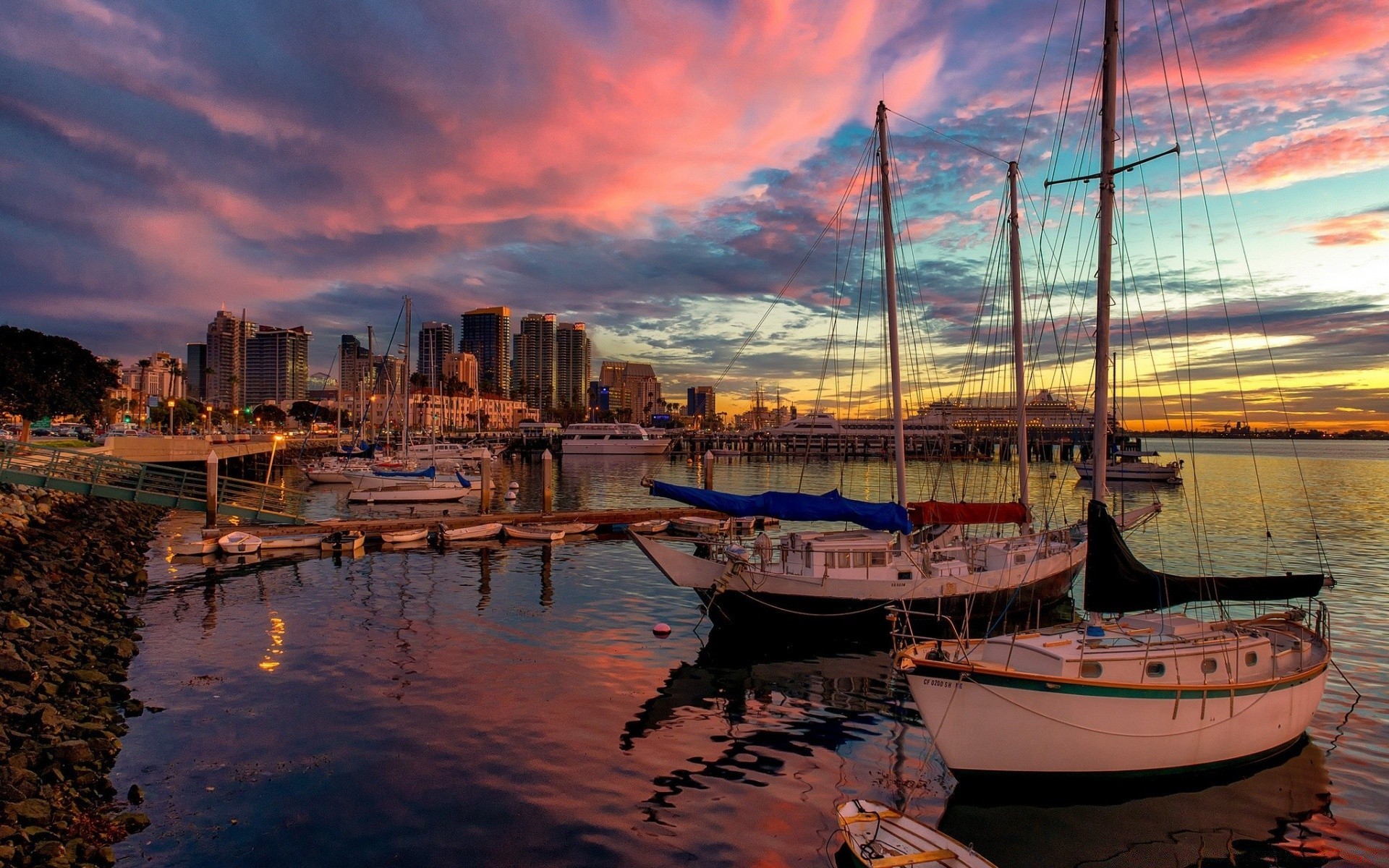 america water sea travel harbor reflection boat sunset watercraft pier city marina sailboat sky seashore ocean yacht tourism dawn ship