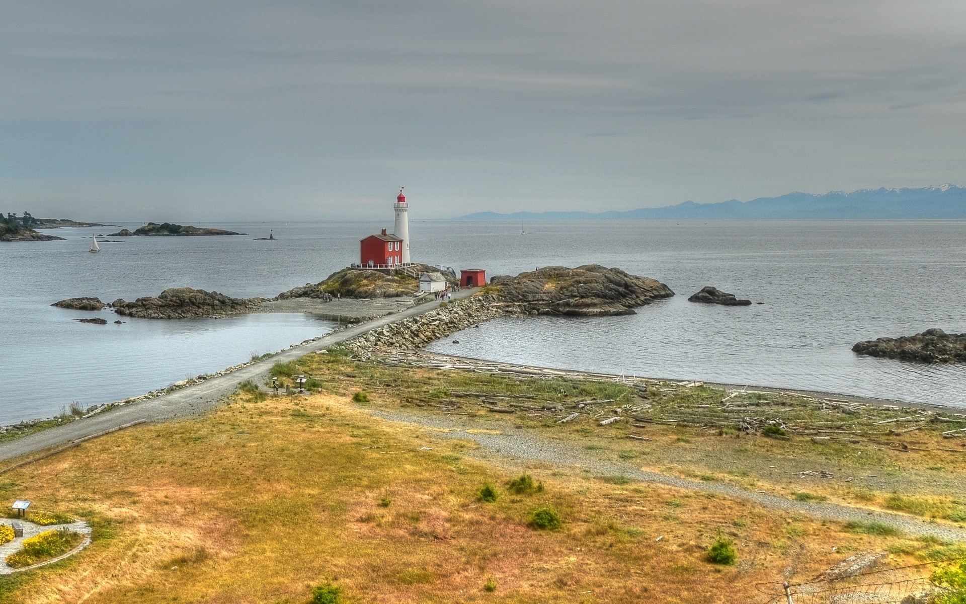 america water sea seashore lighthouse beach ocean landscape travel rock sky outdoors shore scenic nature seascape daylight