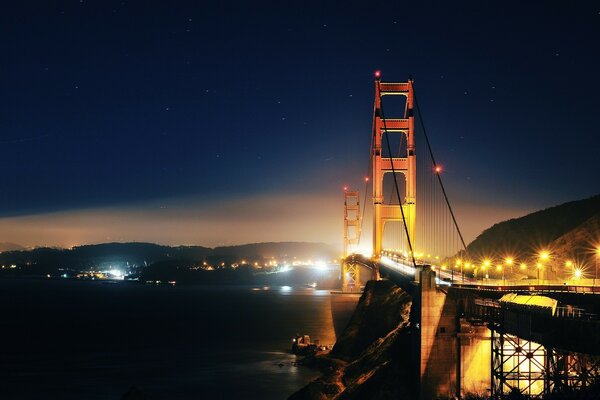 Automobile bridge in the night twilight